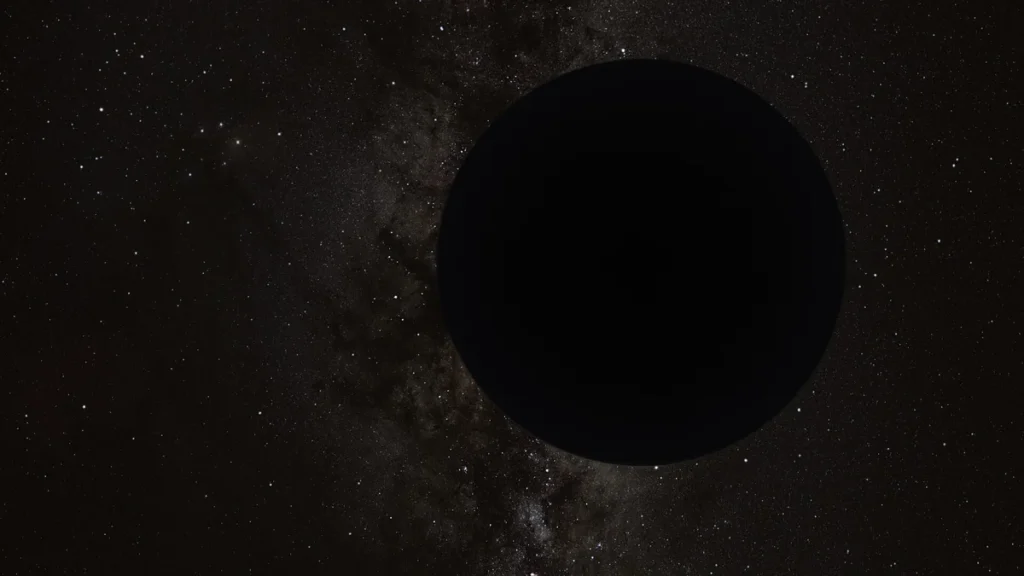 A large black circle obscuring a starry Milky Way background, representing a dark cosmic object.