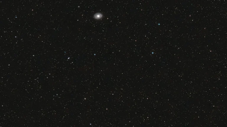 Deep-space galaxy cluster with bright central galaxy under study for cosmic reionization research