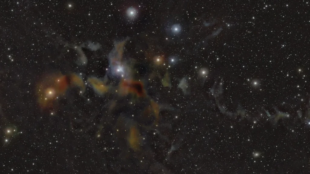 A wide-field view of colorful nebula clouds and bright stars in the star-forming region NGC 7129.