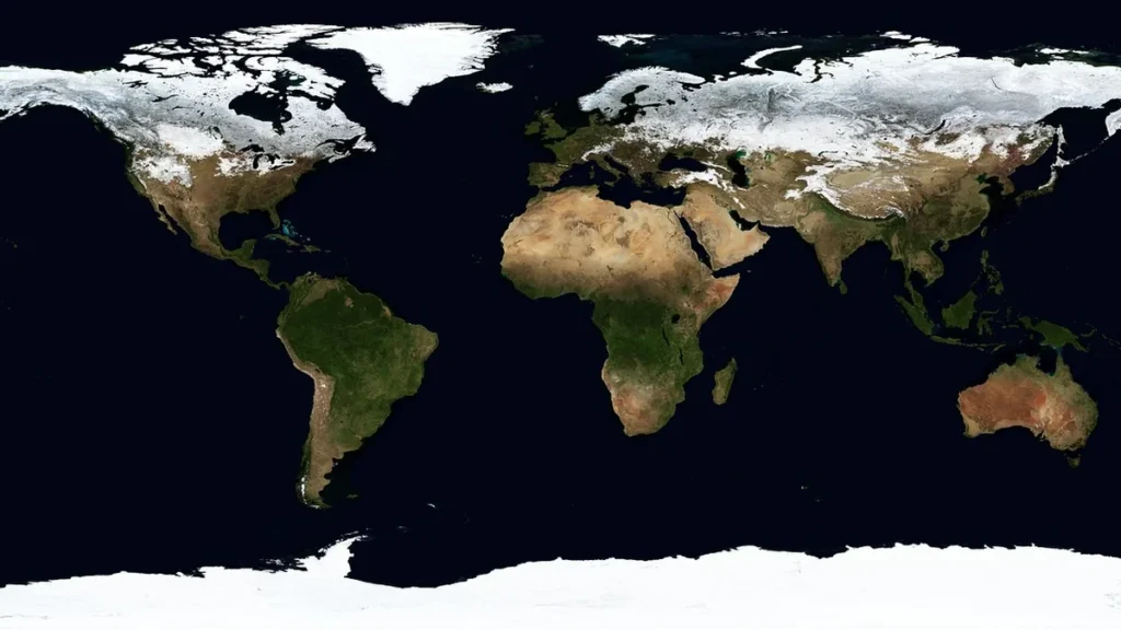 Global satellite view of Earth showing snow cover across the northern latitudes and the icy continent of Antarctica.
