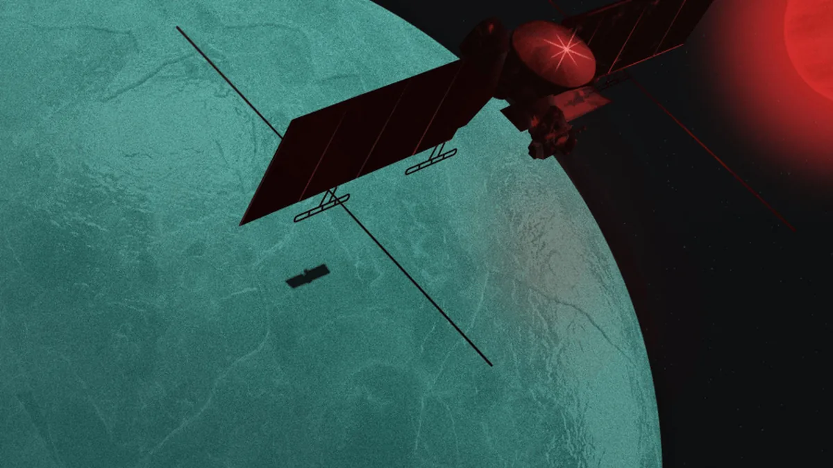 A spacecraft casting a small robotic rover shadow over a greenish icy moon under a red glowing star.