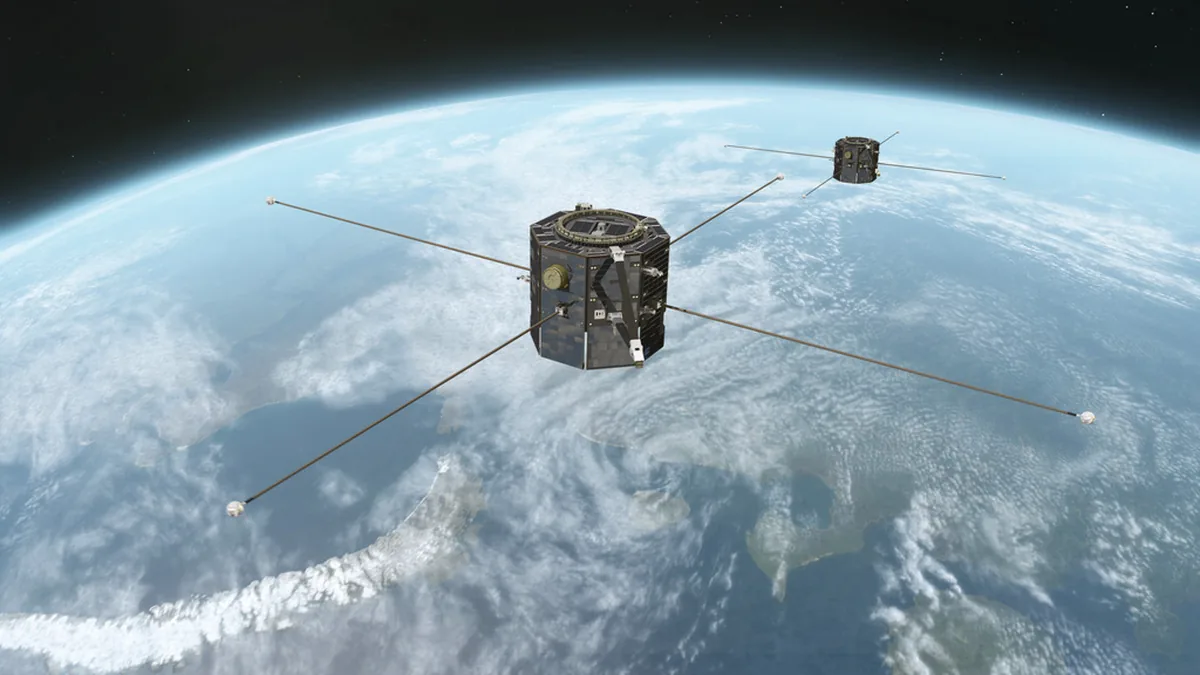 An artist's rendering of the twin TRACERS satellites orbiting Earth to study magnetic reconnection.