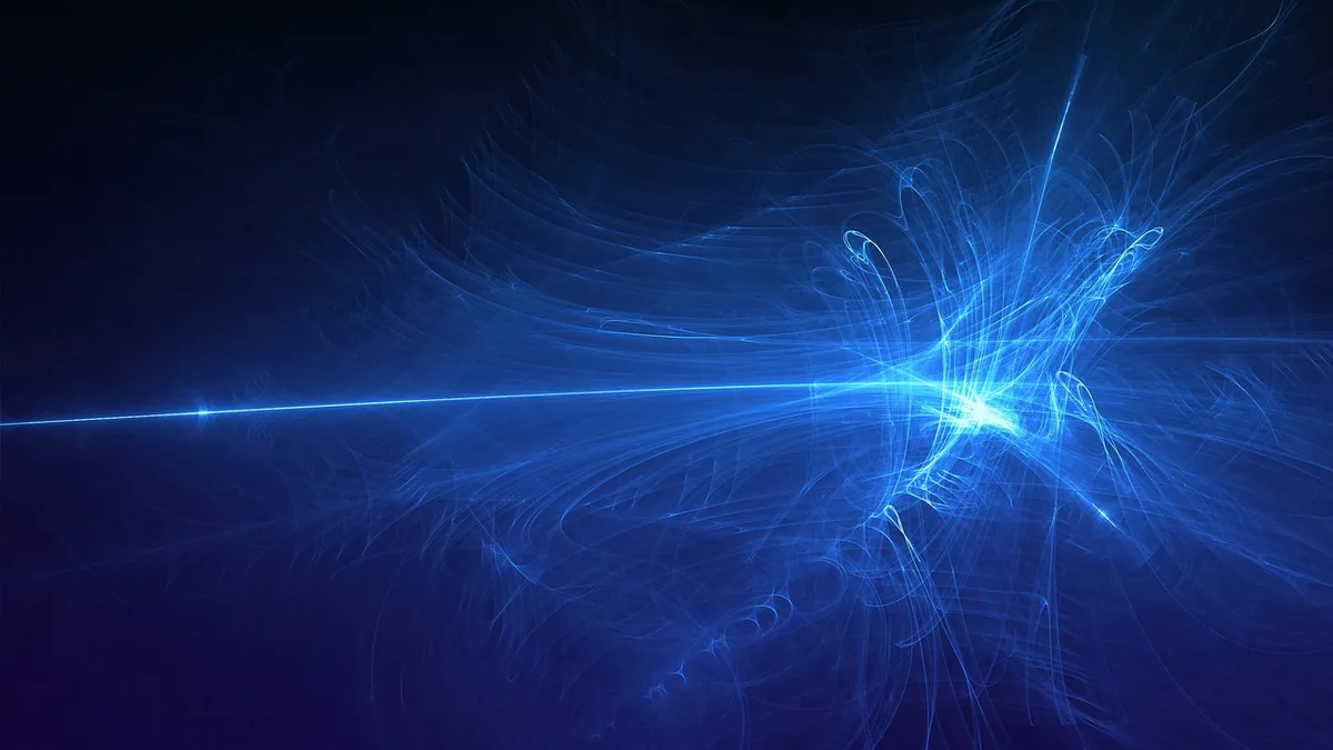 Abstract blue glowing line branching into wispy cosmic trails against a dark background.