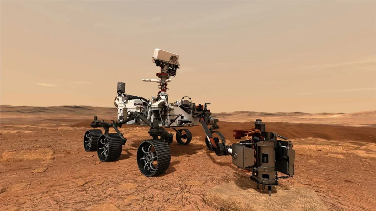 Perseverance rover on the rusty red Martian landscape, robotic arm extended to a surface instrument.