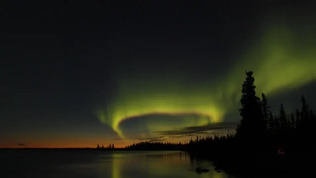 SMILE records daylight aurora around the North Pole