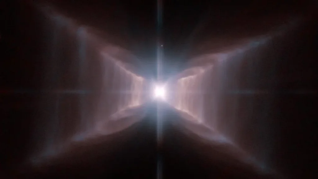 Bright central star shines through symmetrical glowing gas lobes forming a striking cosmic nebula.
